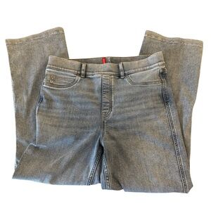 Spanx The Get Moving Pull-On Wide Leg Jeans in a light gray wash.